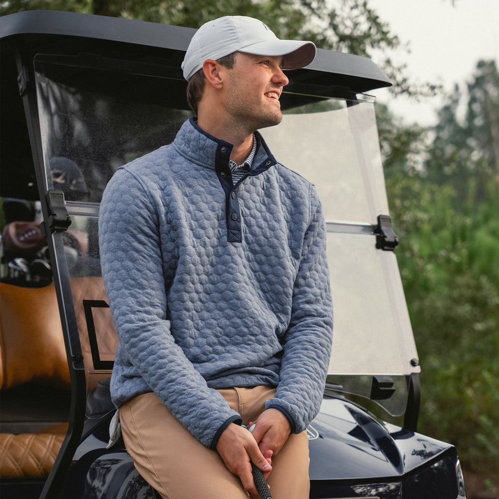 Man wearing a Rhoback Q-Zip outdoors
